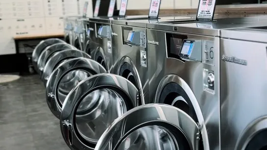 Commercial Laundromat vs. Home Laundry Service in Eau Claire: Why the Difference Matters